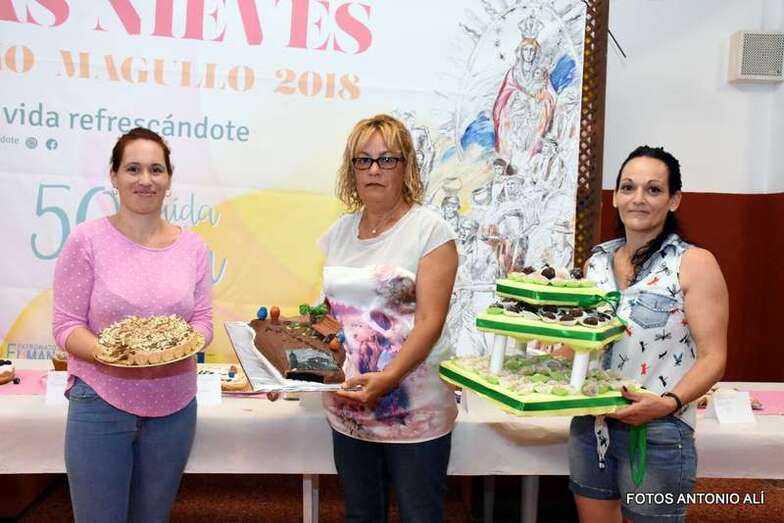 Las tres ganadoras del concurso de repostería (Foto Antonio Alí)